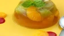 Tropical Jelly with Peach & Raspberry Coulis