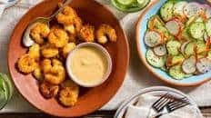 Coconut shrimp with cucumber salad and spicy pineapple-ginger mayo