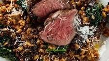 Grouse risotto with wild mushrooms and cavolo nero