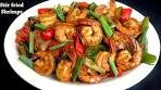 Honey stir fried shrimps with garlic and onions