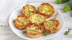 Mini quiche alle zucchine e speck