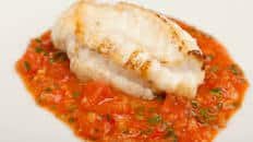 Monkfish with tomato, ginger and garlic