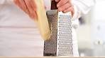 Parmesan cheese being grated – Ottieni la licenza per i video ...