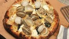 Pizza With Fresh Clams, Garlic, Mozzarella, Romano, and Basil Recipe