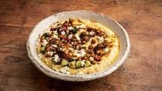 Preserved lemon hummus, chilli oil, ras el hanout chickpeas and pomegranate salad