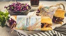 Pulled Pork Sandwich on French Baguette with Cornichon