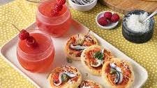 Raspberry Lemonade con pizzette pomodoro, alici, capperi e Grana Padano Riserva