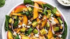 Summer Peach Spinach Salad with Avocado, Toasted Almonds + Goat Cheese