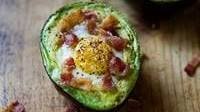 Baked Eggs in Avocado with Bacon on Toast