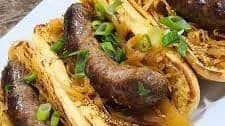 Bison Bratwurst and Sauerkraut on a Bun