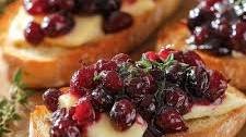 Crispy Crostini with Balsamic Roasted Cranberries and Creamy Brie