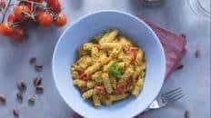 Fusilli pasta with pistachio pesto and cherry tomatoes