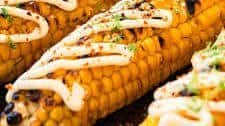 Grilled corn with mayo, lime and tajin