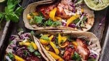 Honey BBQ Salmon Tacos with Mango Slaw