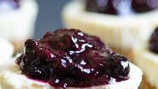 Mini Goat Cheese Cheesecakes with Berry Compote