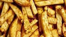 Oven-baked celeriac root wedges