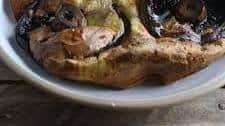 Portobello toad in the hole with red onion gravy and squash mash