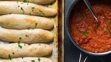 Quick and Easy Homemade Breadsticks with Spicy Marinara