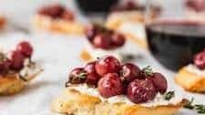 Roasted Grape and Honey Goat Cheese Crostini