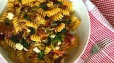 Rustic Shallot and Tomato Rotini with Bacon and Feta