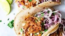 Slow Cooker Pulled Pork Tacos with Cilantro Lime Slaw