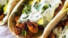 Spicy Chicken and Avocado Tacos with Creamy Cilantro Lime Sauce