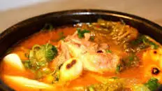 The Momofuku Cookbook's Kimchi Stew with Rice Cakes Recipe