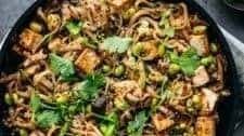 Vegan Rice Noodles with Crispy Tofu and Mushrooms