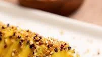 Addictive Cucumber Salad with Aji Amarillo, Sesame and Crispy Quinoa