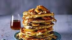 Chocolate-filled pancakes with caramelised banana