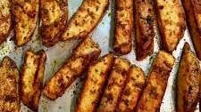 Crispy garlic and herb potato wedges