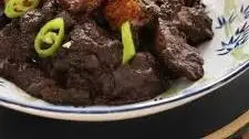 Dinardaraan (pork blood stew with crispy pork belly)