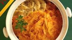 Easy Scalloped Potatoes: A Cheesy & Herbed Delight