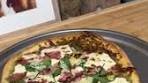 Green goodness on a crispy crust—pesto pizza perfection ...