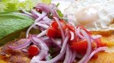 Llapingachos or Ecuadorian stuffed potato patties