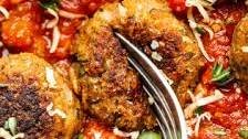 Meaty vegan meatballs in tomato sauce