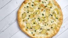 Pizza with Fingerling Potato, Garlic Confit, Rosemary, Sage, and Brown Butter