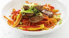 Pork medallions with vegetable stir-fry