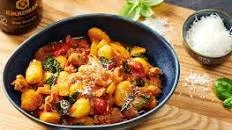 Spicy tomato and sausage gnocchi with fennel and spinach