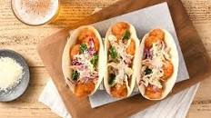 Sweet and Spicy Shrimp Tacos with poblano slaw and cotija