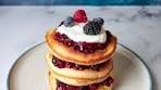 The ultimate berry pancakes, topped with crème fraiche and ...