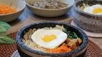 Vegetarian dolsot (stone pot) bibimbap with gochujang peanut ...