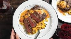 Pan-Seared Ribeye Crown With Tomato Basil Fondue and Saffron Risotto