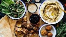 Vegan hummus platter with falafel, tabbouleh & makali