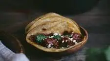 Braised Mole Beef Tacos with Cilantro & Queso Fresco