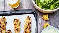 Honey-garlic chicken skewers with garlic scape (flower) oil and tarragon sauce