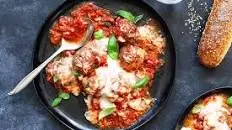 Mozzarella-Stuffed Meatballs in Tomato Sauce