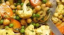 Stir-fried spicy curried vegetables with coconut milk