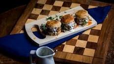 Buffalo Biscuit Sliders with buttermilk blue cheese dressing