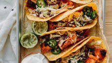 Grain-Free Salmon Tacos with Spicy Cabbage Slaw and Lime Crema